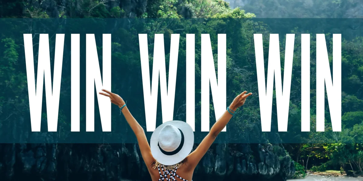 Woman with raised arms in a tropical setting with text reading WIN WIN WIN.